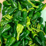 Poblano chiles are prepped for Majka’s corn pizza. Photo by Rachel Valley
